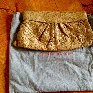 Laura Merlin tan woven clutch
